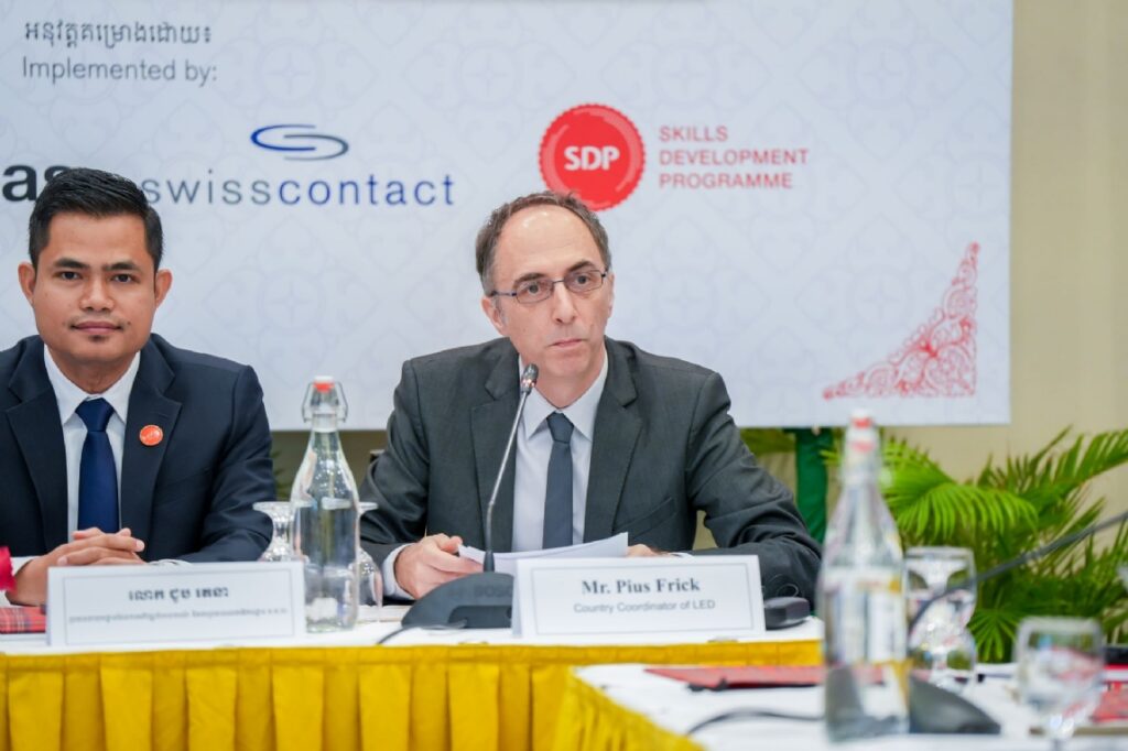 LED representative speaks at a formal development programme meeting with Swisscontact and SDP