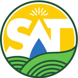 LED logo with yellow sun, green hills, and blue mountain in a circular emblem